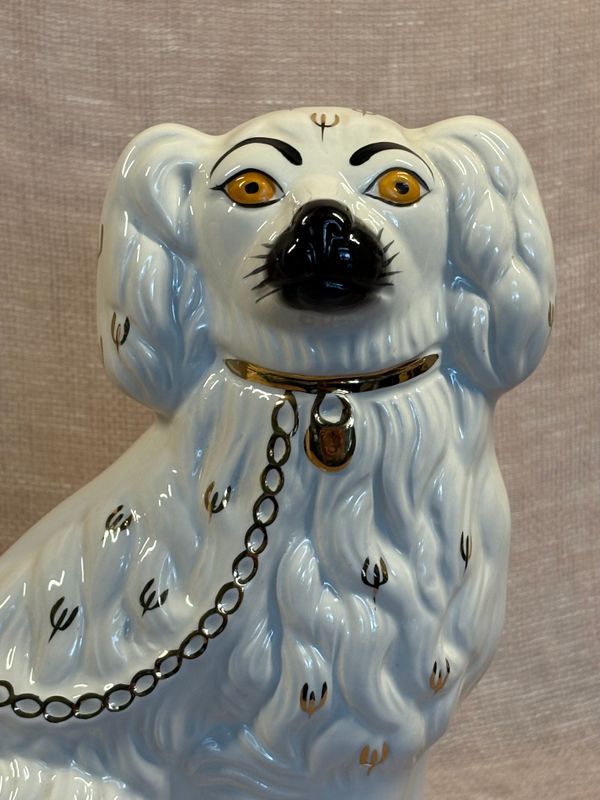 Close-up van het handgeschilderde snuitje van een keramische Beswick hond.